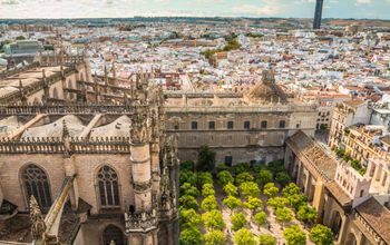 Seville Spain (photo via PocholoCalapre / iStock / Getty Images Plus)