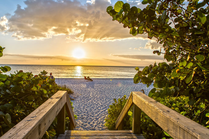 Beautiful Sunset on the Beach of Naples, Florida (Susanne Neumann / iStock / Getty Images Plus)