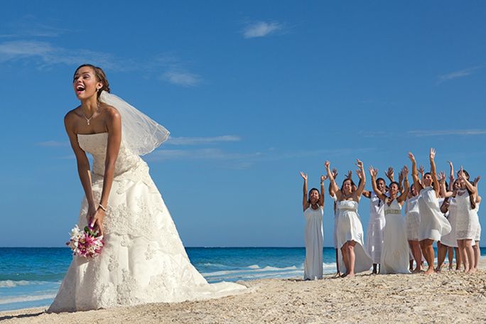 bride throwing the bouquet