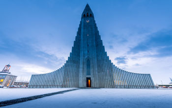 Hallgrimskirkja cathedral in reykjavik iceland (photo via surangaw / iStock / Getty Images Plus)