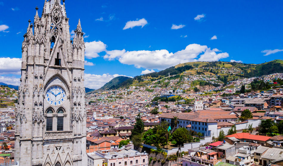 Ecuador, city view of Quito from gothic Basilica del Voto Nacional clock tower