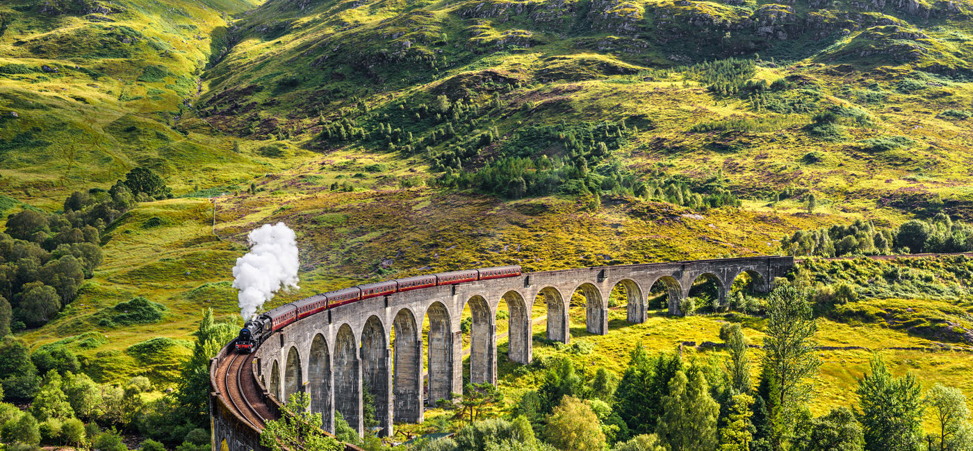 Image: Glenfinnan Railway Viaduct in Scotland with the Jacobite steam train passing over. (Photo via miroslav_1 / iStock / Getty Images Plus( (Photo Credit: miroslav_1 / iStock / Getty Images Plus)