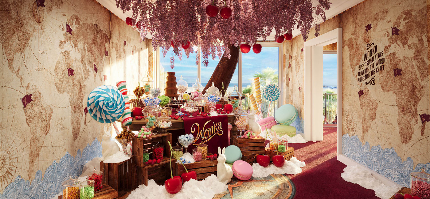 Image: Rendering of the living room area in one of ‘Wonka’s Sweet Suites’.  (Photo Credit: Booking.com)