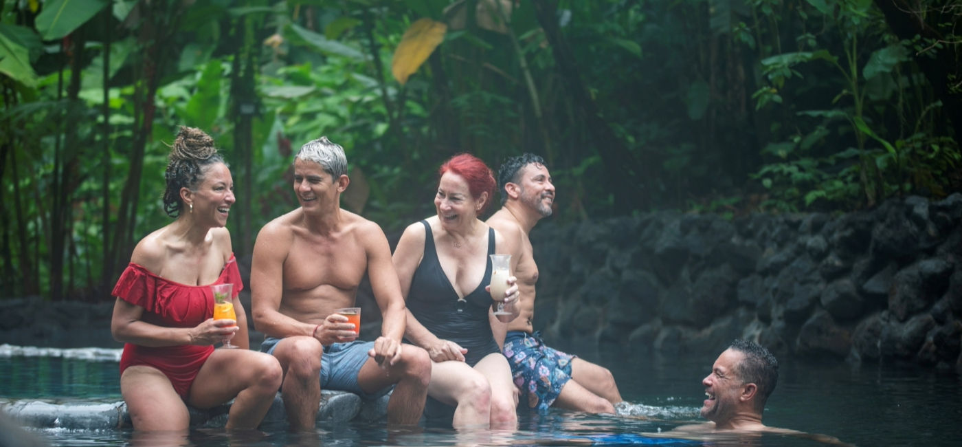 Image: Travelers enjoy La Fortuna's hot springs in Costa Rica on a G Adventures' Geluxe trip. (Photo Credit: G Adventures)