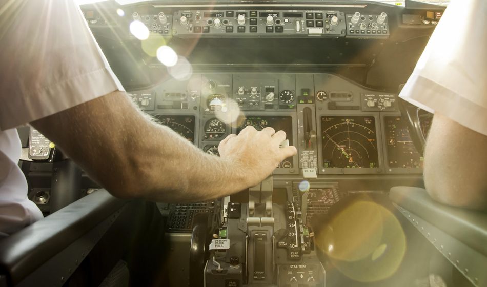 Pilots before take off, cockpit, airplane