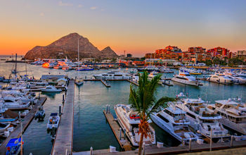 Cabo San Lucas Marina at sunset (Photo via LindaYG / iStock / Getty Images Plus)